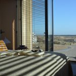 Strandhotel Zoomers Castricum met uitzicht op strand en zee 11